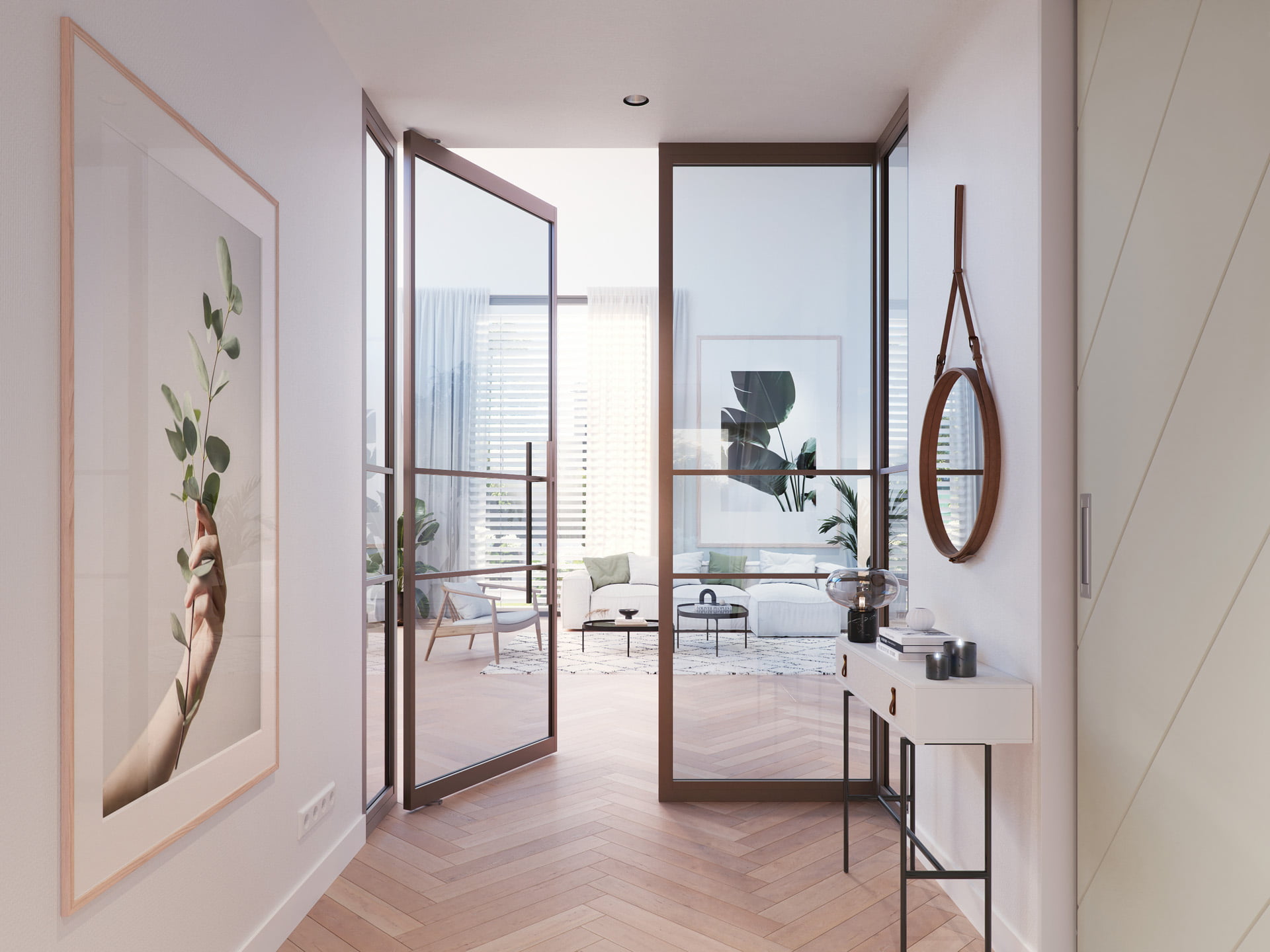 Un couloir moderne et lumineux avec un sol en bois à chevrons, une porte vitrée menant à un salon ensoleillé, un décor minimaliste, un miroir rond et une œuvre d'art botanique encadrée au mur.