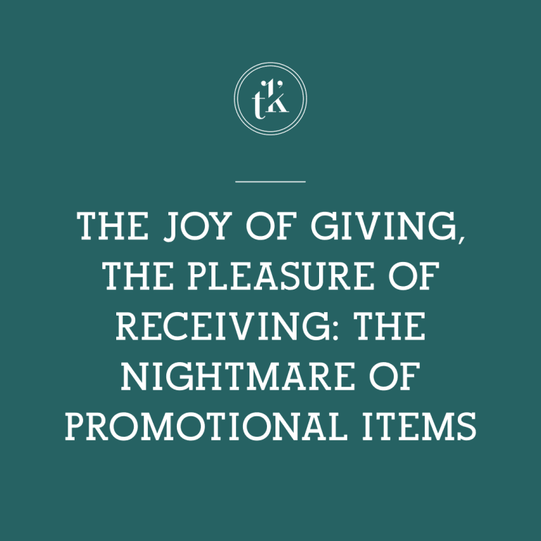 White text on a teal background reads: The joy of giving, the pleasure of receiving: the nightmare of promotional items. A round logo with the letters tk is above the text.